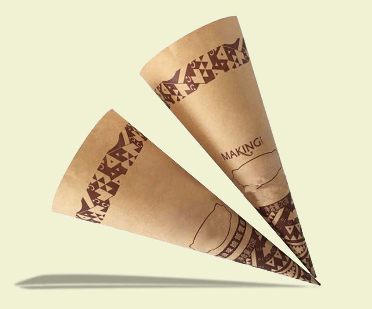 Custom printed cardboard cone sleeves wrapped around filled ice cream cones