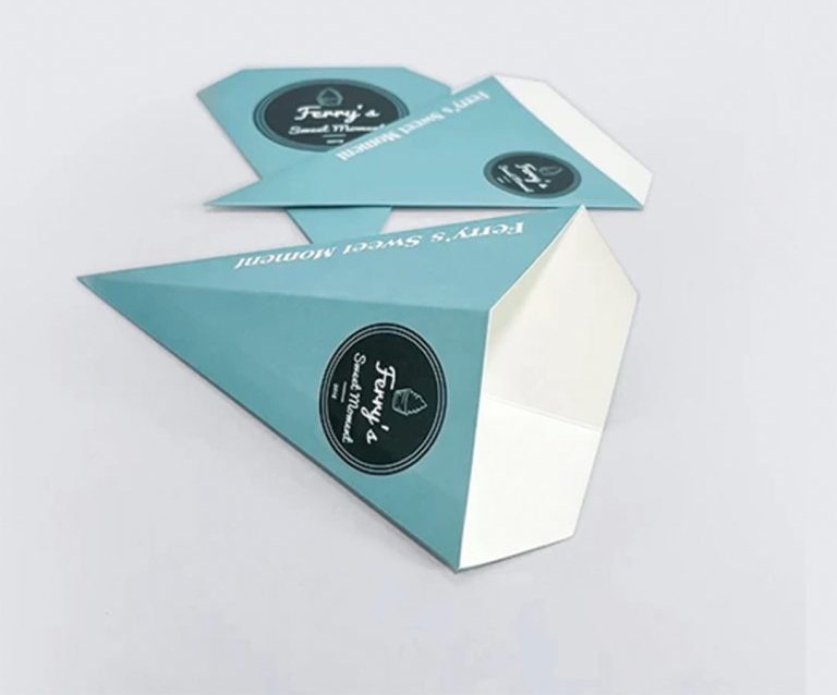 Printed crepe sleeve holding a rolled crepe filled with fruit and cream