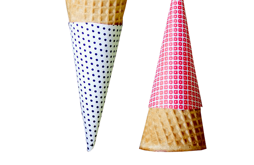 Printed waffle cone sleeve shaped to the wide ridged cone body