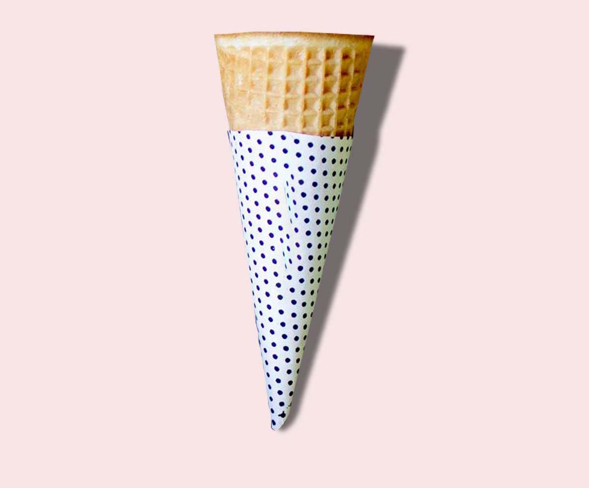 Custom printed waffle cone sleeves stacked ready for use